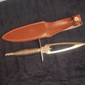 Stainless Steel from Pakistan daggar with Leather Sheath, brass Handle.